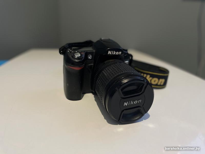 Nikon d5100 пробег. Фотоаппарат nikon d7000 body. Крышка объектива nikon d5100. Крышка для объектива nikon d3000. Nikon d5200.