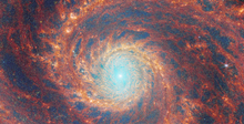 Посмотрите на инфракрасный снимок спиральной галактики Водоворот